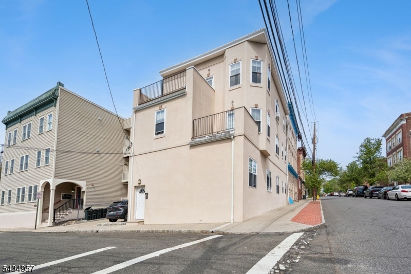 Hard-to-find 3BR/2BA condo in a prime commuter location! Don't miss out on this beautifully updated, move-in ready 3BR/2BA condo with private entrance and soaring ceilings. Sun-filled interior showcases gleaming hardwood floors, central A/C, and an updated eat-in kitchen with granite countertops and stainless steel appliances. Open-concept living/dining area is perfect for relaxing or entertaining. All 3 sun-filled bedrooms boast high ceilings. Versatile finished basement with washer/dryer adds even more storage potential and flexible space ideal for a home office, gym, or playroom. Deeded parking conveniently located next to building. Unbeatable location just 1 block to NYC direct train! Moments to Montclair's vibrant downtown filled with top-rated dining, boutique shopping, and arts. This is truly an opportunity not to be missed!
