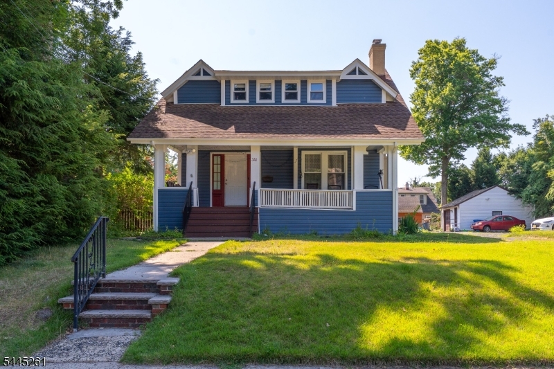 Rare Find! Timeless Character Meets Modern Comfort! Welcome to this beautifully updated Sears-Roebuck Modern Home, situated on an oversized 100' x 150' double-width lot on one of Dunellen's most picturesque streets. This move-in-ready home perfectly blends the timeless charm of Arts & Crafts architecture with today's modern updates. Original detailsincluding the inviting front porch, beamed ceilings, stained-glass window, and period lightingare beautifully complemented by new siding, replacement windows, fresh interior paint, and a renovated kitchen featuring new cabinetry, countertops, and appliances. Offering 5 bedrooms, 2 full baths, and a powder room, this home provides spacious living areas ideal for both everyday living and entertaining. The basement includes a laundry area and multiple storage rooms for added convenience. Enjoy the expansive backyard with endless possibilities for entertaining, gardening, or simply relaxing outdoors. Ideally located just minutes from NJ Transit, parks, shopping, restaurants, and major highways, this exceptional home offers the perfect balance of historic charm, modern comfort, and commuter convenience. Don't miss this rare opportunity to own one of Dunellen's most distinctive homes!
