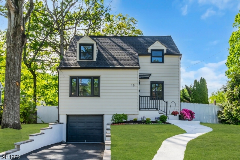 Stunning Cape Cod Completely Remodeled with Designer Finishes Throughout! This Beautiful Home Features a Bright Open-Concept Living & Dining Room Filled with Natural Light, Flowing into a Gorgeous Modern Kitchen with Sleek Cabinetry, Quartz Counters, Mosaic Backsplash & Stainless Steel Appliances. Step Outside to a Large Patio and a Huge Grassy Backyard Perfect for Relaxing, Entertaining, or Play.The Main Level Offers 2 Spacious Bedrooms and a Beautiful Full Bathroom. Upstairs Features 2 Additional Oversized Bedrooms and Another Updated Full Bathroom. The Finished Basement Adds Incredible Living Space with a Large Family Room, Laundry Room & Utility Room. Major Upgrades Include Brand New HVAC, Water Heater & 200-Amp Electrical Panel.This Home is a Commuter's Dream with Easy Access to Major Highways, Bus Routes, Parks, Shopping & Dining. Situated in a Top-Rated Blue Ribbon School District, Fanwood was Ranked A+ by Niche as the #1 Town to Live in Union County. Making This an Amazing Opportunity to Own in One of the Most Desirable Communities!