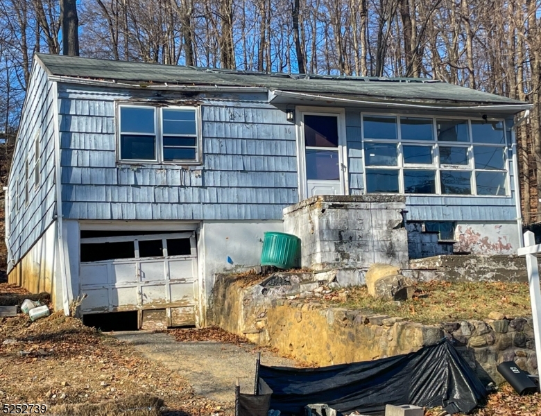 Excellent opportunity to build your ultimate lake house in desirable White Meadow Lake. House being sold "as is", with interior demo already performed. Architectural plans for a 2400+ sq ft 5-bedroom colonial included, with township approval already received. Home has public water, sewer, with gas in the street. Rennovation loans welcome! Use caution while on property. Enjoy all WML has to offer with 2 pools, tennis/pickleball courts, athletic fields, clubhouse, lake access, playgrounds, year-round community events and easy access to Rt80 and shopping.