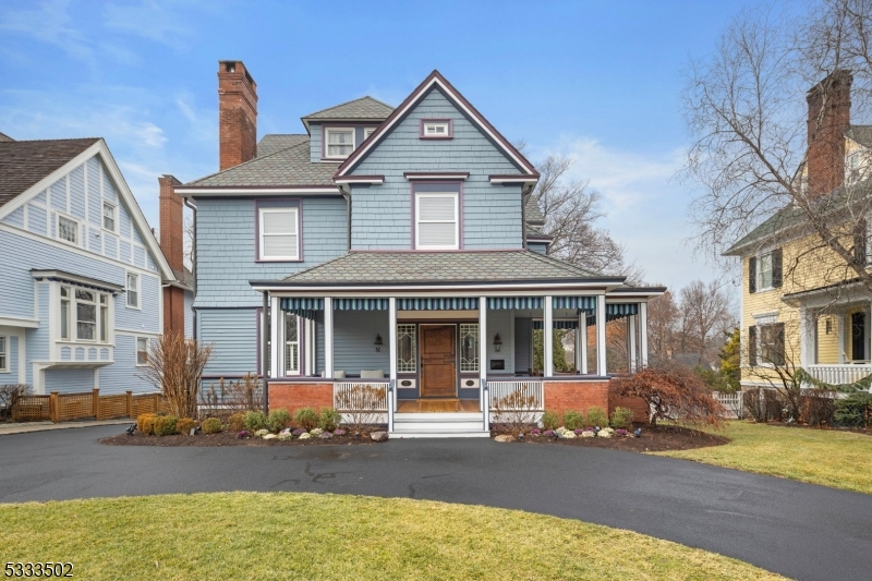 Welcome to Morristown's Historic District, where timeless charm meets modern luxury. Located just 2.5 blocks from Downtown, this stunning Victorian home has been fully renovated and meticulously restored, offering a rare combo of historical craftsmanship and contemporary amenities. The home features a custom kitchen with Viking and Sub-Zero appliances, a wet bar, and stone countertops.  and a reclaimed clawfoot soaking tub that adds a touch of elegance.Recent updates include a new furnace, central A/C, a period-inspired roof, copper gutters, and a freshly painted exterior, ensuring both comfort and historical authenticity. The inviting wraparound porch with a swing welcomes you home, while the rear deck overlooks professionally landscaped grounds with mature trees and lush perennials.Inside, a grand formal foyer sets the tone, leading to a gracious floor plan with high ceilings and vintage details such as pocket doors, intricate moldings, and built-ins. The flexible layout includes bedroom configurations on the second and third floors.  Main bath with heated marble floor and clawfoot soaking tub.  A cozy second-floor rear porch provides a quiet nook for relaxation.Situated just around the corner from The Kellogg Club and minutes from the NYC train, this home combines elegance, convenience, and a rich connection to Morristown's history. Close to major highways.