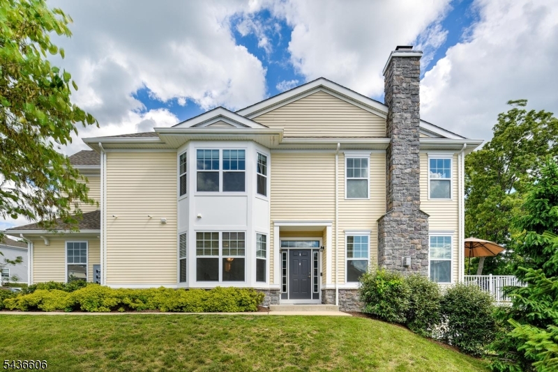 Welcome to 14 Lupine Ln, a beautifully appointed end-unit townhome in the highly desirable Panther Valley community. This spacious Augusta model 3-bedroom, 2.5-bath home with a 2-car garage w/ 2800 Sqft of living space offers an open & inviting floor plan designed for today's lifestyle. The main level features a open-concept layout highlighted by hardwood flrs, oversized windows that showcase spectacular views & natural light. The gourmet kitchen boasts 42" cabinetry, granite ctrs, SS appliances, a lrge center island with breakfast bar & seamless flow into the living & dining areas. The fml dining room is perfect for entertaining, spacious living room features a gas fireplace and direct access to a composite deck overlooking scenic surroundings. Upstairs, the Spacious primary suite offers tray ceilings, a large walk-in closet & Master bath complete with a soaking tub, stall shower, double vanity, and granite ctrs. 2 additional lge sized bedrooms include ample closet space, with one featuring its own walk-in closet. A convenient 2nd flr laundry room w/ closet completes the upper level. The walk-out finished basement provides a versatile open-concept space ideal for a recreation room, home office, gym, media room, or guest area. Sliding doors lead to a private patio. Residents enjoy exceptional Panther Valley amenities, including 3 outdoor swimming pools, multi-sport courts, playground, scenic walking trails & bike paths. Minutes to highways, shopping, dining & recreation.
