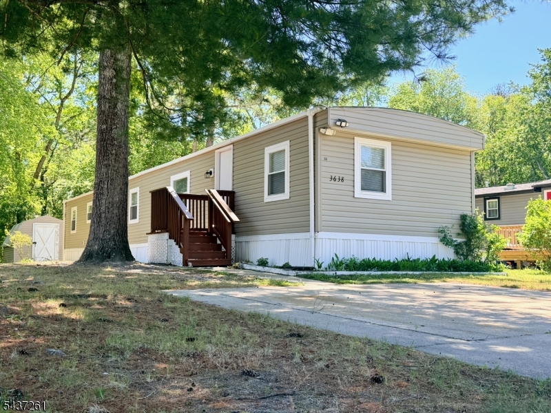 Located in the Belaire Estates Subdivision of Pemberton Township, this beautifully renovated 2-bed, 1-bath mobile home offers a combination of comfort, convenience, and modern style. Situated in a residential setting, this home is approximately 15 minutes from JBMDL. Shopping, dining, and everyday amenities are nearby, with a recreational area and playground within walking distance. The home is located within the Pemberton Township School District.Offering approximately 950 square feet of living space, this home was extensively renovated in 2026 and features a bright, open layout, a modernized kitchen, and comfortable bedrooms. Brand-new appliances and contemporary finishes throughout make this property move-in ready.Major upgrades include a new forced-air heating and central air conditioning system, as well as natural gas service for efficient and reliable heating. Additional highlights include a double driveway, public water and sewer utilities, and a land lease that includes several services.The current land lease is $735 per month and includes property taxes, water, and garbage removal.  Buyers should independently verify all approval requirements with park management, 650 score required to obtain land lease.An excellent opportunity for buyers seeking affordable homeownership in a convenient Burlington County location. Schedule your private showing today to see all that this property has to offer.