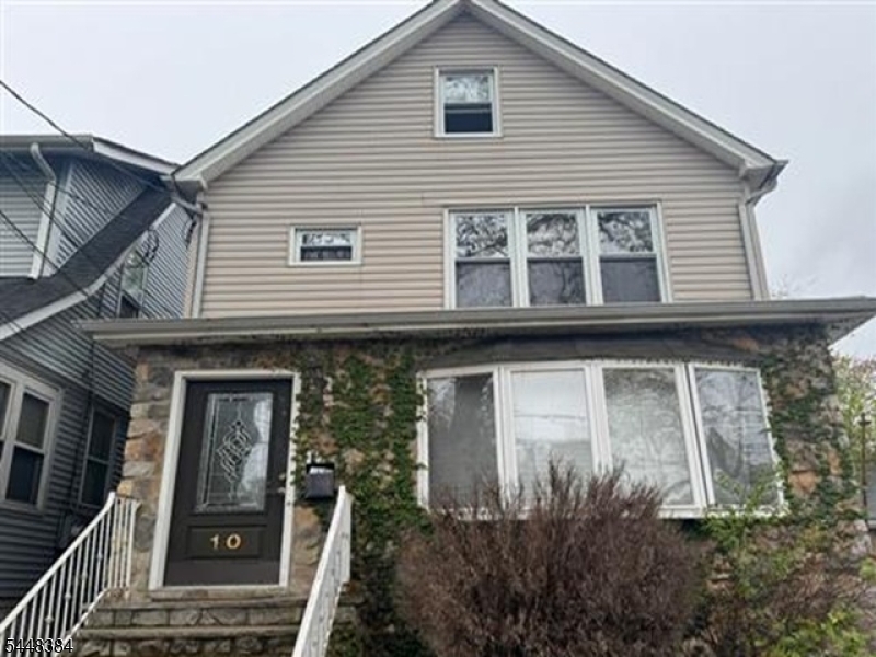 Two-family Colonial-style residence offering approximately 1,602 square feet ofliving space with 4 bedrooms and 2 full bathrooms across two residential units.Situated on an approximately 3,100-square-foot lot, this property provides an opportunity for owner-occupants or investors seeking a multi-unit property in an established residential neighborhood.The property features a traditional two-story layout, public water and sewer service, a full unfinished basement for additional storage and utility space, and offstreet driveway parking.Located in the Watsessing section of Bloomfield, the property offers convenientaccess to public transportation, commuter routes, shopping, dining, parks,schools, and regional employment centers. The surrounding area consists primarily of residential housing with convenient access to everyday services andtransportation options.