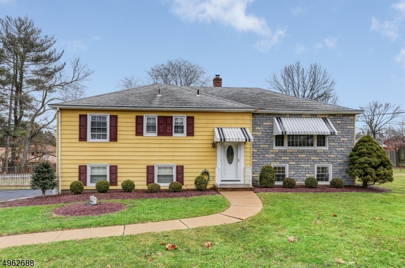 4 Bedroom home in the sought-after location in Hanover Township known for its low taxes & excellent schools. Walk to Malapardis Park where you will find a playground, ball fields & a spot to picnic. First floor with living room, kitchen, dining room, 3 bedrooms & 1 1/2  baths. Kitchen with generous amount of counters & cabinets.Enclosed sun room off of dining room. Ground level offers bedroom with 1/2  bath, family room, laundry, & access to garage. Freshly painted with hardwood floors. Oversized  2 car garage with plenty of room.  Large flat backyard.  Township has a beautiful town pool (additional fee), community center, before/after school programs. Minutes away from Morris Plains station with NYC Midtown Direct Train. Convenient to major highways. Morris Plains address but house is Cedar Knolls.