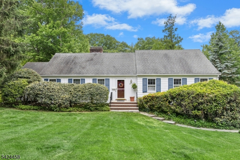 This charming ranch-style home sits on a 0.29-acre lot in a sought-after Berkeley Heights neighborhood. The main level features an entry foyer with a coat closet, an updated eat-in kitchen with sliding doors to the new deck, a living room with a fireplace and access to the sunroom, a formal dining room, three bedrooms, a full bath, and a powder room. The partially finished lower level includes a recreation room with a gas fireplace, a storage/utility room, a laundry area, garage access, and a door to the backyard. Recent updates include the deck and exterior painting in 2023, as well as the AC, back roof, refrigerator, and dryer in 2021. Additional highlights include hardwood floors on the main level, a bright sunroom, a new deck overlooking the park-like backyard, and a two-car attached garage with electric door openers. It is conveniently located just minutes from the Berkeley Heights YMCA, community pool, elementary school, and more.
