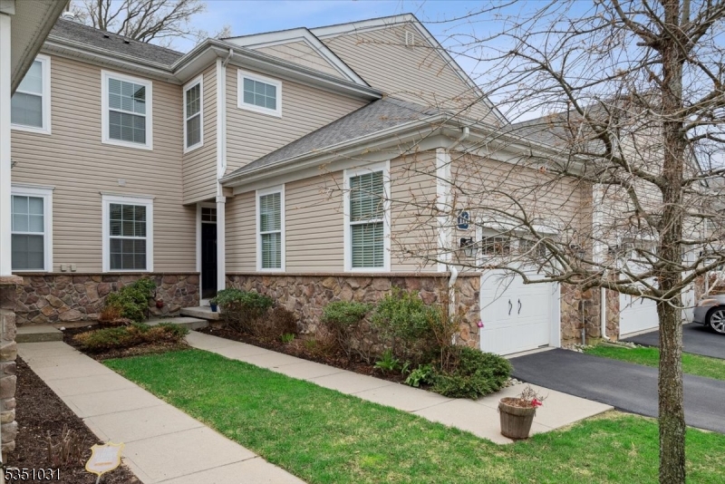This mint-condition townhome offers 2 spacious bedrooms, 3.5 baths & an attached 1-car garage, tucked into a quiet, well-kept community with everything you need just blocks away. A beautifully landscaped entryway welcome you into a bright & airy main level featuring gleaming hardwood floors & recessed lighting throughout.The well-equipped kitchen boasts rich wood cabinetry, a peninsula w/seating, SS appliances, & a cozy breakfast nook w/convenient access to the garage. The open-concept living & dining room centers around a charming corner fireplace & flows effortlessly to a paver patio ideal for entertaining. A dedicated home office & stylish half bath complete this level. The finished LL offers a large rec-room, full bath, generous storage space & additional area perfect for a home gym, guest space, or playroom. Upstairs an oversized primary bedroom w/a tray ceiling, 2 WIC & en-suite bath w/dual vanity, soaking tub & stall shower. A spacious 2nd bedroom, hallway bath, laundry room round out this thoughtfully designed home. Located in desirable West Caldwell, just minutes from top schools, grocery stores, boutiques & a wide range of dining options. Enjoy nearby parks & recreation as well as convenient access to major highways for an easy commute to NYC or anywhere in North Jersey. Known for its suburban charm, community events & excellent town services, West Caldwell is a place you'll love to call home. Move-in ready & beautifully maintained   just unpack & start enjoying