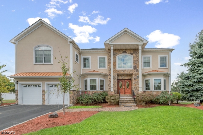 Custom built Colonial on a quiet cul-de-sac in desirable Carriage Pointe section of Piscataway. Enter the sunlit foyer with sweeping staircase. On either side is the living room and dining room. The kitchen feat. a center island and breakfast bar with butlers pantry, marble countertops and beautiful cabinetry. The over-sized family room feat. gas fireplace and deck to the outside with lovely in-ground pool. First floor laundry, garage access and bedroom for added convenience. Ascend the staircase to the second level feat. master bedroom and bath with an extremely large walk-in closet. 3 other bedrooms, large loft area and baths complete this floor. The basement includes a rec room and media room perfect for entertaining. A 2 car garage and beautiful landscaping complete this home!