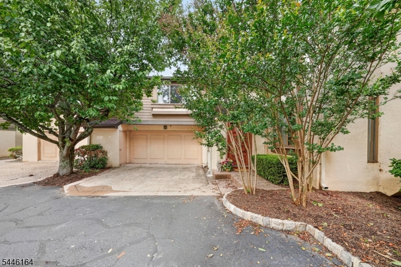 Welcome to this beautifully maintained 2-bedroom, 3.5-bath Carnegie Model in the highly sought-after Princeton Landing community. Bright, airy, and thoughtfully designed, this home offers spacious living areas, excellent natural light, and a versatile layout ideal for comfortable everyday living and entertaining. Each bedroom features its own spacious private bathroom, creating a desirable suite-style setup. The finished walk-out basement adds valuable living space and includes a full bathroom and wine cellar, making it perfect for guests, recreation, a home office, or extended entertaining. Recent updates include a brand-new HVAC system and hot water heater, offering added peace of mind. Enjoy outdoor living on the generously sized deck, surrounded by privacy and mature landscaping. Additional highlights include a 2-car garage and access to Princeton Landing amenities, including swimming pools, tennis courts, clubhouse, and scenic trails. Conveniently located just minutes from Downtown Princeton, Princeton Medical Center, Lifetime Athletics, Route 1, and Princeton Junction Train Station, this home offers the perfect combination of space, privacy, amenities, and location.
