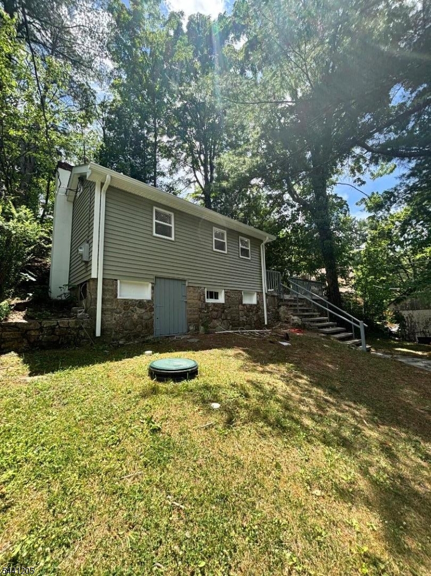 This Charming Fully Renovated 1-Bedroom Single-Family Home combines modern updates, privacy, and an excellent location making it an ideal rental opportunity. Bright and inviting, the home features recessed lighting throughout, creating a warm and modern atmosphere. Step outside to a large deck, perfect for relaxing, dining outdoors, or enjoying your morning coffee. Situated on a quiet street, this home provides a peaceful setting while remaining conveniently close to major highways including Routes 15 and 80, making commuting easy. Shopping, dining, and the local mall are just minutes away, offering everyday convenience right at your doorstep.
