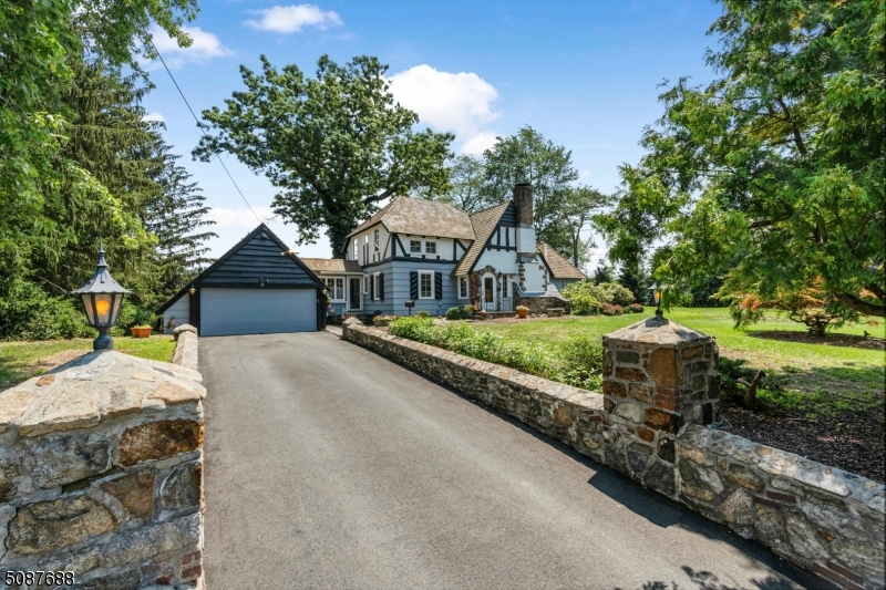 Welcome to "Fantasy" a Lakefront Estate home located on Manitou Island in prestigious Lake Mohawk. "Fantasy" was built in the summer of 1928 as the first home built on Manitou Island. There were plenty of locations to choose from but this home site was chosen because it was a Double Size Lot; second, it has over 200 feet of prime frontage on the main lake; and the last being its breathtaking views. As the FIRST CRANE HOME BUILT on Manitou Island, it was constructed before there was a bridge to the island. Almost all materials were barged over to construct the home. Many of the wooden logs in the grand living room were harvested from the property surrounding the home. This estate has retained its original footprint since 1928 but has been upgraded throughout the years making this a MUST SEE!