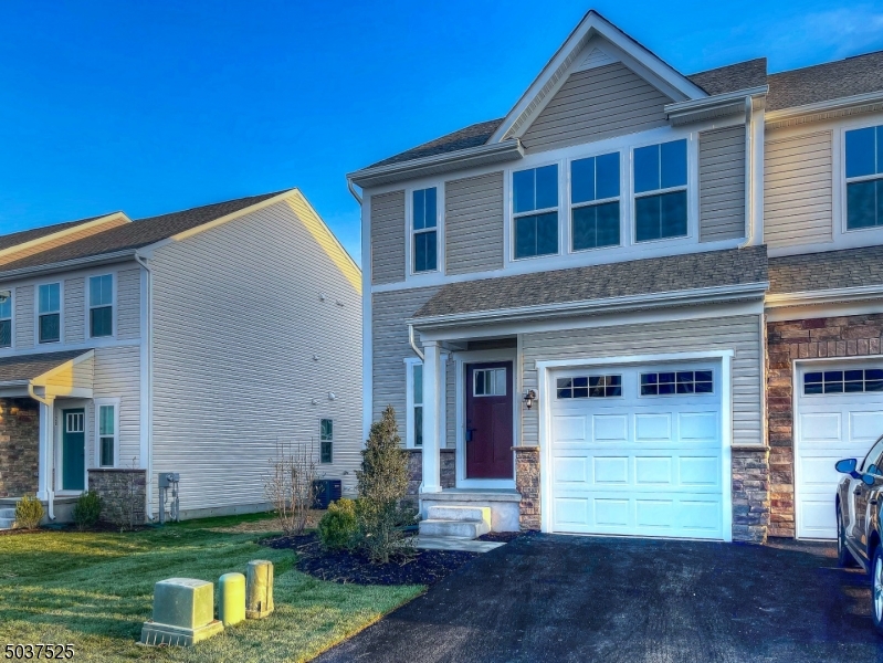 BRAND NEW - 3 bed. 3.5 bath townhome, 6 ft. extended Roxbury model in Stonegate at Sparta.  Sleek, modern end unit located in the interior of this exciting new community. The main level boasts an open concept floor plan that incorporates a cook's kitchen featuring a large center island with breakfast bar, extra tall cabinets, granite counters and SS appliances. Three ample sized bedrooms each with walk-in closets and two full baths with laundry room upstairs. Over-sized full finished basement with full bath. Purchased water softener just installed.  Walking distance to Sparta's latest shopping attraction complete with grocery store, retail, and dining.  Excellent rated schools, close to skiing, boating, golf, and more. Close to major commuting, bus, rail and direct highway to NYC.