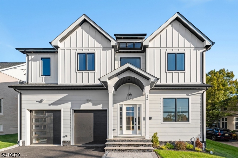 Welcome to this brand new, custom colonial home, surrounded by luxurious residences and situated on a sprawling 15,000 sq. ft. lot, offering endless possibilities to create your dream outdoor oasis. With a 10 Year Builder's Warranty, this masterpiece spans approximately 5,000 sq. ft. across three meticulously designed level. Boasting 6 bedrooms and 5.1 bathrooms, the home greets you with a grand 2 story foyer and 10 foot ceilings throughout, leading to sophisticated living and dining rooms adorned with intricate millwork and rich hardwood floors. Chef's kitchen, featuring high end appliances, a large center island with quartz countertops, custom cabinetry, a wet bar, and a walk in pantry. A gas fireplace with stone surround while sliding doors open to a deck overlooking the oversized. The first floor offers an en suite bedroom. Upstairs, you'll find four additional bedrooms, including the luxurious master suite, complete with a tray ceiling, an oversized walk in closet, and a spa inspired bath featuring a soaking tub, stall shower, and double vanity. The finished basement with 9 foot ceilings offers even more versatile living space, including a bedroom, full bathroom, and a large recreation room with a wet bar. Located in one of Livingston's most coveted neighborhoods. Don't miss the opportunity to make it your own!