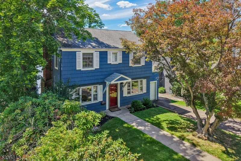 Welcome to St. Cloud-One of West Orange's most cherished neighborhoods, known for its strong sense of community & timeless homes. Character, charm & backyard retreat w/beautiful sunset views await in this delightful Colonial filled with warmth, period details & inviting spaces designed for everyday living & entertaining.The Living Room featuring a wood-burning F/P, beautiful architectural character & timeless appeal. The spacious Family Room enjoys natural light, w/walls of windows overlooking the deck & hot tub. Whether enjoying a quiet evening @ home or entertaining guests, this space connects indoor/outdoor living. The Kitchen offers white cabinetry, quartz countertops, chic backsplash & access to the deck & outdoor entertaining areas. The sun-filled Dining Room provides the perfect setting for everyday meals & special gatherings. The Powder Rm completes the 1st floor. Upstairs, you'll find 2 B/Rs, updated main Bath & spacious Primary Suite featuring renovated ensuite Bath. The Lower Level offers exceptional flexibility w/sound studio that can easily serve as Recreation Rm, private Home Office, Exercise Rm, Laundry & lots of storage. The deck & hot tub create the perfect setting for unwinding, while the expansive lower patio provides add'l space for entertaining, dining, or simply enjoying the outdoors. Newer Furnace & C/A. Only 3 blocks from South Mtn Reservation. Near Turtle Back Zoo, Codey Arena, shopping, dining, NYC trans, major highways & Midtown Direct train access