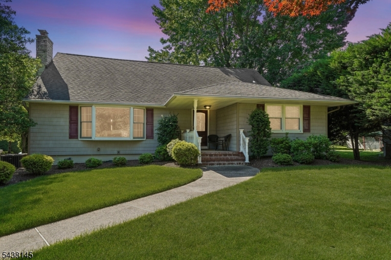 Welcome to this spacious 4 bedroom, 2 bath home situated on an oversized corner lot in Scotch Plains. This well maintained residence features hardwood floors, generously sized rooms, formal living room with fireplace, formal dinning room and an eat in kitchen with center island, granite countertops, and stainless steel appliances. A sun filled sunroom with vaulted ceilings overlooks the expansive backyard, creating the perfect space for relaxing or entertaining. The second floor offers spacious bedrooms, while the full basement provides abundant storage. Outside enjoy a beautiful landscaped property with a large yard and ample outdoor space. Conveniently located near parks, recreation, shopping transportation and major highways.