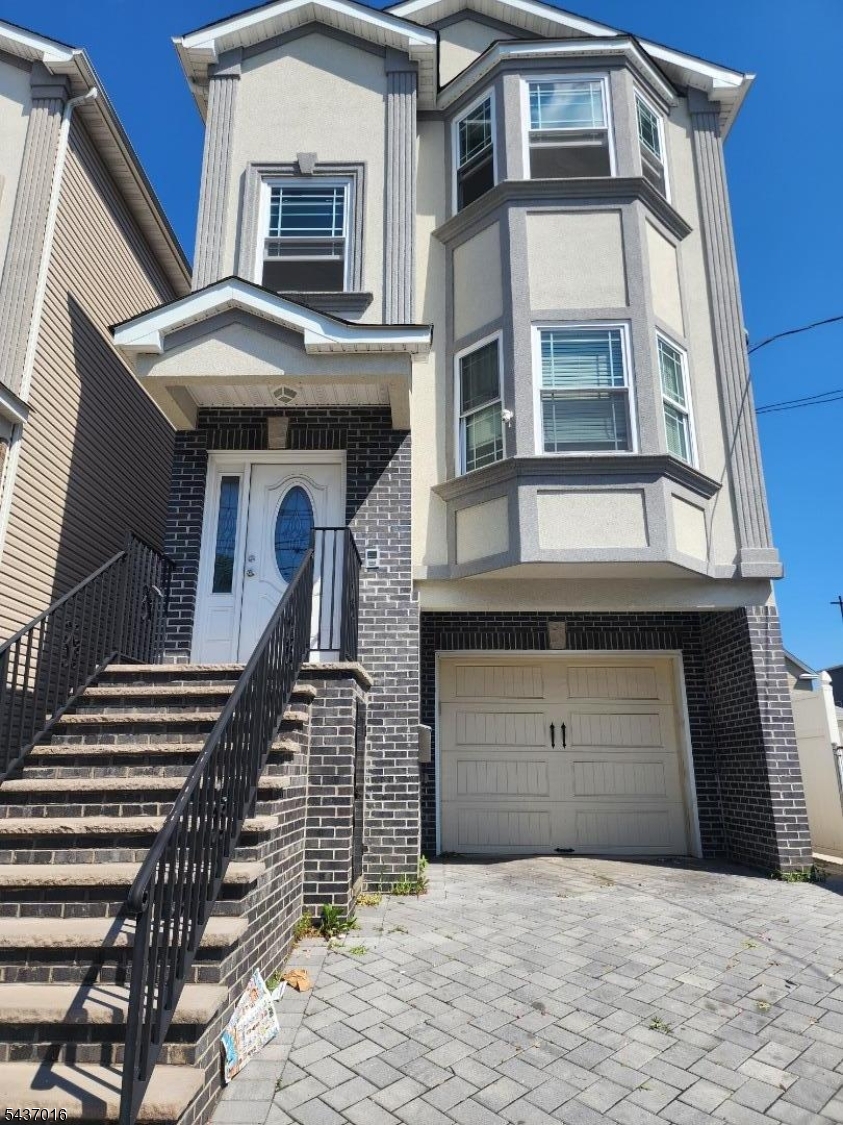 Modern 2 Family Home built on 2020, Feels like new yet offers top of the line appliances. Hardwood floors throughout, first floor and recreation room attached with 3 full bathrooms. Private and fenced backyard. Call now for a private showing. "Property taxes to be verified"