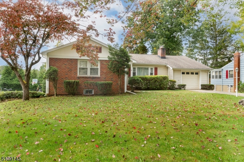Welcome home to this sprawling, meticulously maintained Ranch home with offers and amenities galore! Extraordinary value in Dover with minutes to the Midtown Direct, easy highway access to Route 10, 46 and 80.  Dynamite home with many updates, gorgeous backyard, walk-up attic, HUGE finished basement spanning the entire length of the house. Nestled in a quiet neighborhood, this home offers hardwood floors throughout.  Spacious living/family room with a beautiful wood burning fireplace and recessed lighting. The dining room features a room off the side that can be used as a study, office.  Tons of natural sunlight shine through this spacious an open kitchen with a stunning view of a private gorgeous backyard. Newly updated powder room. Three generous sized bedrooms with a large walk-in cedar closet and master bathroom in master bedroom! The finished basement is a canvas for endless possibilities! DON'T MISS OUT ON THIS OPPORTUNITY!!!