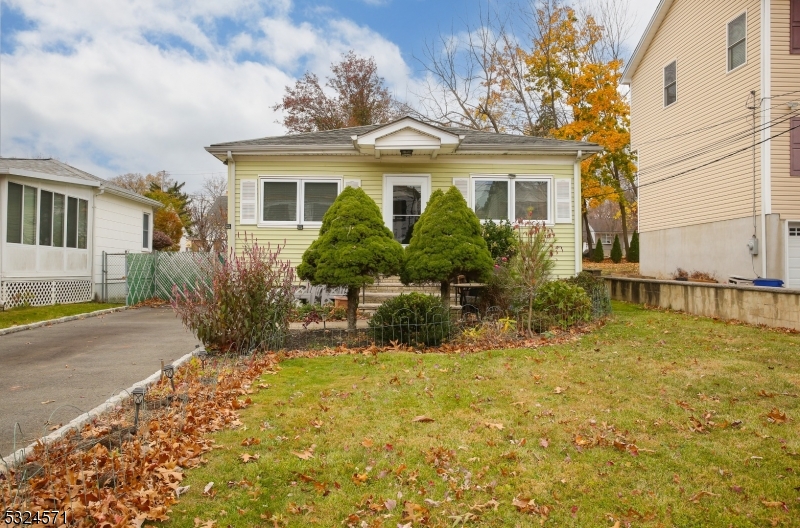 LOCATION, LOCATION!!!  Welcome to Lake Parsippany!!!  This charming single-story ranch home exudes warmth & curb appeal, featuring a classic light yellow exterior with white trim and shutters. A welcoming front entry with a small porch is framed by well-maintained landscaping, including neatly trimmed shrubs and two distinctive evergreen trees.  A charming and inviting living space, perfect for relaxation and gatherings awaits you. An expansive driveway, and a fenced in backyard with a paver patio and two sheds are just a few of the outdoor amenities that complete this home.  Enter the front door to be greeted by a living room that features a bright, airy ambiance with natural light streaming through multiple windows. Adjacent to the cozy living room, the dining area offers a seamless flow for entertaining. Situated near a large window, the dining area enjoys plenty of natural light, enhancing the room?s warmth and openness.The proximity to both the living room and kitchen makes the dining area ideal for hosting, allowing easy access for serving and socializing. As you stroll through the hallway, you are presented with two bedrooms, a full bathroom and a master bedroom.  The kitchen, with its warm wood cabinetry and functional layout, is equipped with essential appliances, TONS of cabinet space and a gas stove and dishwasher. Located in the desirable Lake Parsippany community, this home combines comfort with the charm of lake-style living; all that is left to do is MOVE IN!!!