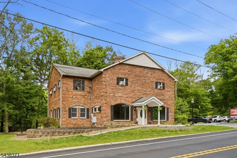 Prime commercial lease opportunity on highly visible Route 94 in Blairstown. Formerly operated as a spa and wellness center, this approximately 3,211 SF space includes the entire first floor and finished basement, offering a flexible layout with multiple treatment rooms, offices, reception areas, and open workspace. Ideal for salon, beauty, wellness, massage, aesthetics, skincare, medical wellness, counseling, or other professional service uses. Situated on approximately 1.8 acres with abundant on-site parking and excellent exposure. Town-approved uses currently include salon, beauty, wellness, massage, and similar professional services. Conveniently located near downtown Blairstown, Blair Academy, and Route 80. Excellent opportunity to establish or expand your business in a highly visible location with ample parking and a layout designed for client-focused services.