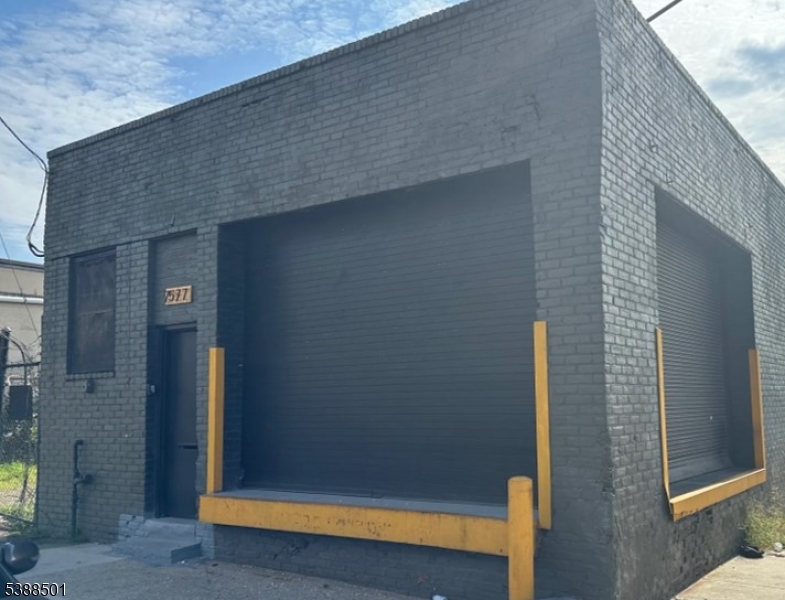 Excellent opportunity to lease a total of 5,000 sq. ft. in the desirable Ironbound section. This property includes a 2,500 sq. ft. warehouse plus an adjoining 2,500 sq. ft. lot (75 Goble St), offering flexibility for a variety of business uses.Situated on a corner lot, the property features 2 loading doors, making it ideal for storage, distribution, contractors, automotive use, or other commercial operations. Convenient location with great accessibility.