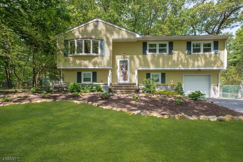 Absolutely charming 3 bedroom, 1 full 2 half bath bi-level in quiet little neighborhood in Boonton Township.  Updates galore!  New kitchen open to dining and living rooms, access to the deck, master bedroom on main level with half bath & closet, 2 additional bedrooms & main bath complete the main floor.  The lower level offers a family room, 1 bedroom, an office, laundry room, powder room.  Everything is light & bright, updated and ready for a new owner.  Looks like Joanna Gaines was here with a shiplap wall and charming decor.  Mt. Lakes High School, closet to transportation, highways, shopping and more!
