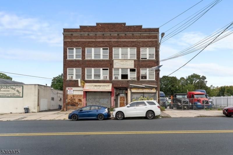 Exceptional investment opportunity in Hillside! This mixed-use property offers two commercial spaces on the first floor and upper levels with excellent potential for apartments or condominiums. Zoned OC (Office Commercial), the property allows for a wide variety of uses including offices and professional buildings, retail stores and personal services, townhouses and condominiums, plus accessory uses such as parking and loading. The sale also includes the adjacent vacant lot at 1448 N Broad St (approx. 8,814 sq ft), providing added space for expansion or new development.With outstanding visibility, strong foot traffic, and a prime location just minutes from Newark, Jersey City, and New York City, this is a rare chance to bring your vision to life in a high-demand area.