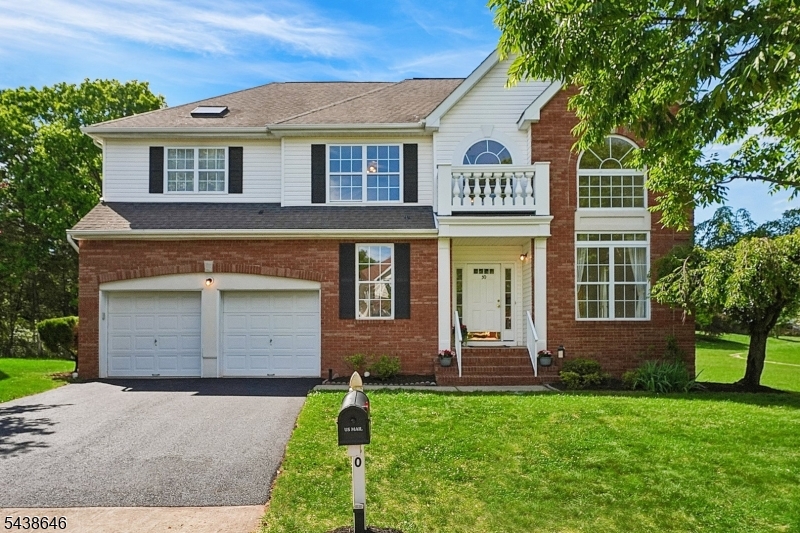 Feel at home from the moment you enter this popular community, where flowering cherry trees, groomed grounds, a tranquil pond, and amenities create a welcoming setting. At the end of the cul-de-sac, this majestic brick front colonial sits on a premium lot with no homes behind. A weeping Japanese cherry and mature shade trees frame the home beautifully. A two story foyer with double palladium windows fills the space with natural light and introduces the home's open, updated layout. NEW hardwood flooring leads past French doors to the home office and into the bright white kitchen with 42" cabinets, neutral countertops, tile backsplash, stainless steel appliances, NEW 5-burner gas range and hood, beverage bar and pantry. A recent kitchen expansion added bow windows and a second glass door to the oversized full width deck partially canopied by shade trees and overlooking priceless open space to the back and side for exceptional privacy. A family room features a cozy fireplace. Upstairs, four light filled bedrooms offer ceiling fans, NEW carpeting, fresh paint, and walk in closets, plus the convenience of second floor laundry. The primary suite includes a NEW stall shower, soaking tub, and vaulted ceiling w/skylight. A tastefully finished basement provides space for recreation, home theatre and guests. Montgomery continues to grow with new commerce, open air parks, top rated school district and proximity to Princeton.This home blends comfort, updates, and an exceptional setting.