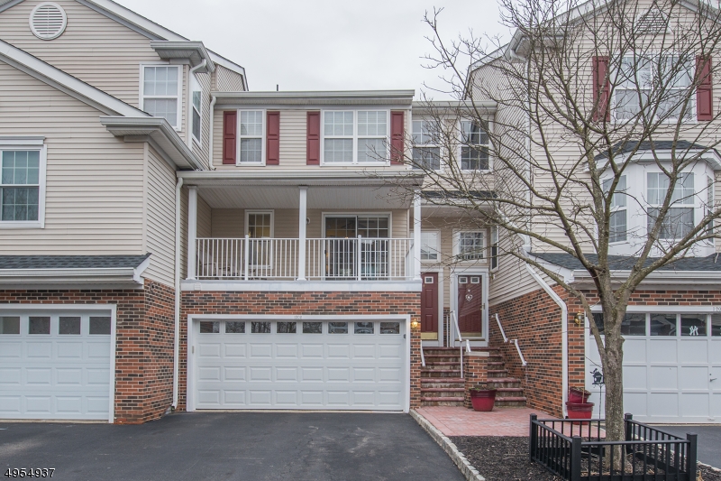 SUPERIOR ASHFORD MODEL, highly sought after in desirable Berkshire Hills! This model rarely comes on the market. Pride-of-Ownership is evident throughout this 2 bdrm/2.5bath unit. Ideal Layout. 2Story Foyer w/Ceramic Tile. Super bright, open yet cozy floorplan. Formal LR w/Gas Fireplace opens to Dining. Kitchen offers convenient breakfast bar. BONUS FR provides so much extra living & versatility. Enjoy the outdoors w/your choice of the oversized front balcony or private back patio. Ground level PR, laundry & 2 car garage. Upstairs hosts 2 bdrms w/en-suites & walk in closets. Master has high ceilings & large soaking tub & stall shower. Exclusive parking for 6 plus addtl visitor spots. Beautifully maintained community w/pool, playground, close proximity to NYC Train/Bus, Major Hwys, shopping & top-rated schools.