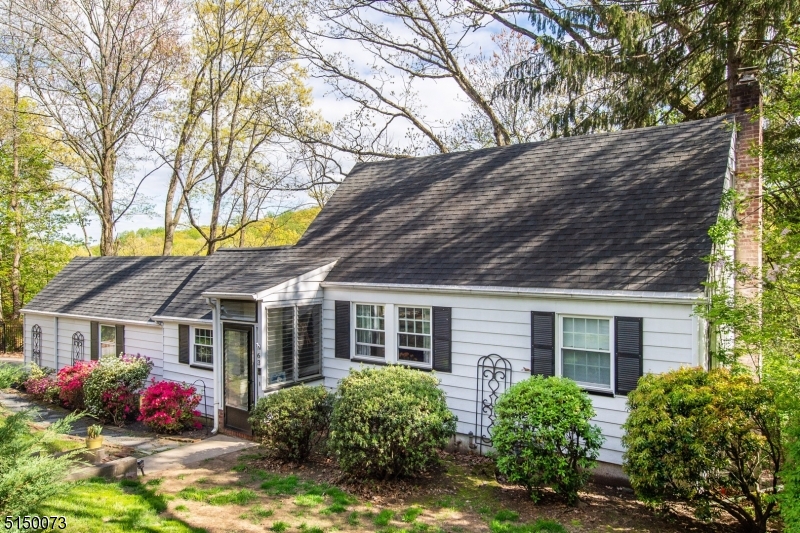 Absolutely Adorable! Updates in all the right places. Great Cape offers versatile living space. Lots of Generous Room Sizes to Spread Out & Make Your Own! Newer white kitchen w/SS appliances & gorgeous granite countertops. Easy entertaining in dining/living areas. 3 Bedrooms & 1 Full Bath - Hardwood flooring throughout 1st level. Basement adds to its spaciousness & organization. 1 Car Garage & shed. Abundance of storage! Tons of natural light & easy access to the back deck- take full advantage of this special, natural setting overlooking Estling Village. Level, private backyard. Situated in a lovely neighborhood on corner lot. Enjoy all the amenities of Indian Lake w/optional membership just a short walk to Clubhouse, events, beaches, boating, fishing, swimming, ice-skating, etc. Easy Access to all Major Highways, NYC-Direct Train and Bus Stops and the Bustling Denville Town Center - Restaurants, Shopping.