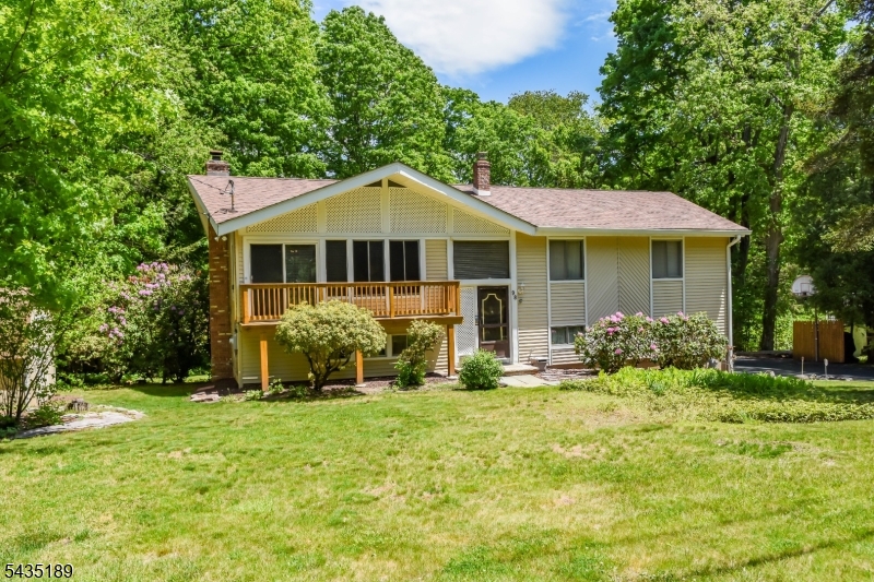 Well Maintained Bi Level in the Newfoundland Section of West Milford.  3 Bedrooms, 2.5 Baths. Soaring Ceiling.  Gorgeous Hardwood Floors Refinished in the Living Room & Dining Room. Brand New Central A/C. No Houses Behind You, Creating a Peaceful, Calming Outdoor Space with a Large Usable Yard Boasting a Lovely Pergola.  Multiples Decks. Perfect for Pets, Gardening, Relaxing or Entertaining. Great location with True Convenience, Close to Sussex County Golf Courses, Local Hiking and Fishing, Boating on Greenwood Lake, and Still Just Minutes from Rt 23 for Quick & Easy Commuting to Shopping. Generous Driveway Parking, Room for Multiple Vehicles or Guests. Solid, Ample Storage. Appliance's Included and a One-Year Home Warranty.
