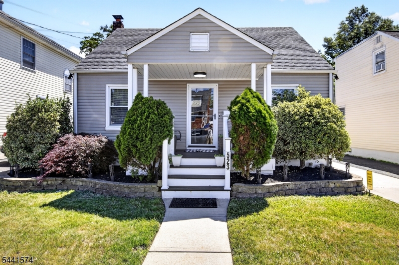 Welcome to this beautifully expanded Cape Cod nestled on a quiet residential street in Linden, NJ. This spacious home offers a versatile layout with room for everyone. The first floor features two comfortable bedrooms, a full bathroom, a bright kitchen, formal dining room, inviting living room, and an additional family or television room. The private second-floor primary suite serves as a true retreat, complete with a full bathroom featuring double sinks and two generous walk-in closets. A standout feature is the massive detached garage, offering exceptional space for vehicles, hobbies, a workshop, or additional storage. The garage also includes a second-floor storage area, adding even more flexibility and functionality. Conveniently located in a peaceful Linden neighborhood while remaining close to shopping, dining, schools, parks, and major transportation routes, this well-maintained home combines comfort, space, and endless potential.