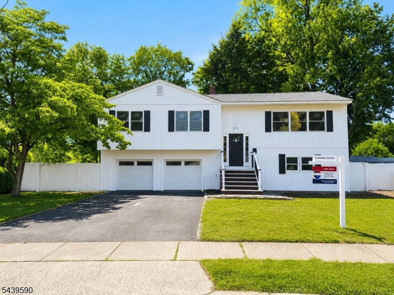 Welcome Home to fully renovated large Bi Level house in Hazelwood Neighborhood in Middlesex Borough. Featuring 4 spacious bedrooms and 3 full bathrooms, this move-in-ready residence offers the perfect blend of modern updates and comfortable living. The heart of the home is the stunning, fully renovated kitchen, with new Porcelain tile flooring, complete with a large center island, ample cabinetry, and plenty of space for cooking, entertaining, and gatherings. Large and sunny living room has hardwood floor and new recess lights. Main level comes consists of 3 bedrooms and 2 bathrooms. Primary bedroom comes with attached bathroom and 2 generous size wardrobes. On the lower level, great room open ups to fully fenced backyard and in ground pool( New liner, filter and Pump). This level have 1 additional bedroom and a full bathroom, This house is fully updated with brand New HVAC system, New water heater, New front vertical siding, new garage doors along with new motors, all new windows on the main level. Its prime location offers easy access to Route 22, i287, i78, Dunellen train station(NJ Transit) and an array of dining & shopping options. Schedule your showing today!