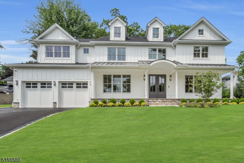 Offering for the first time in Desirable Westfield, this MAGAZINE-LEVEL, Impeccably Designed BRAND NEW CONSTRUCTION 7 Bedroom 6.5 Bathroom Center Hall Colonial. With Over 7000 Square feet of Carefully Planned, Practical & Inviting Living space, this home is sure to impress your most Discerning Buyers. A Covered Front Porch Welcomes you to this Modern Farmhouse inspired home Loaded w/ Upgrades. White Oak Engineered Hardwood flows throughout the 1st 3 floors complemented by Solid White Oak Rails & Stairs. State-of-the-Art Custom EIK features Inset Shaker & White Oak Cabinetry, Exotic Quartz Countertops & Top of the Line Appliances Package.  Designer Lighting. Side Entrance Leads to Built-In Mudroom w/ Lots of Storage & Closet Space. Main Floor In-Law Suite w/ Cathedral Ceilings, En-Suite Full Bath & WIC. 2 sets of French Doors lead to Outdoor Trex Deck. Upper Floor Includes Lux Master Suite & Bath w/ His and Her WIC, Princess J&J Suite, Addnl 2 Bedrooms, Full Bath & Laundry Room. Finished Attic w/ Bedroom, Full Bath & Open Area for Work or Play. Full Finished Basement w/ Guest Bedroom, Full Bath & HUGE open area for Fun & Entertainment. 2 Car Garage w/ Steel Beam for Optimal Space. Hardie Plank & Stone Exterior w/ Board & Batten Trim & Metal Accent Roof. Underground Sprinklers. Security Cameras & Built-In Speakers. 5 Zone HVAC. Superior Walls Foundation. Anderson 400 Windows. Glass Shower Doors in Every Bath. Built In Closets. NOTHING TO DO BUT UNPACK! Schedule a showing TODAY!