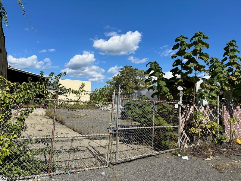 Introducing an investment opportunity in of one of Paterson's I-2 Industrial Zones. This offering includes two adjoining lots 21 - 27 Florida Ave and 198 - 208 Pennsylvania Ave, offering a total of 0.85 acres of highly versatile industrial land with great potential near Railway Avenue. The existing structure on Lot 3 can be demolished for maximum usability of the lots and a larger scale project. Located on Pennsylvania and Florida Avenues, both lots offer excellent access to key industrial and commercial routes. The property offers multiple opportunities for development, including industrial, storage, and commercial uses. Lot 3 on Pennsylvania Ave, is Class 4A with 2024 taxes @ $27,400 (approx.) Lot 4 on Florida Ave is Class 4B with 2024 taxes @ $10,500 (approx.). Owner Financing Available!