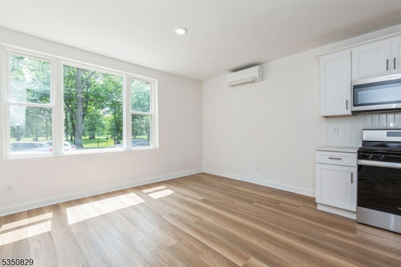 WOW WOW WOW YOUR SEARCH IS OVER FOR THE PERFECT TURNKEY RENTAL! This landlord has brought vision to this 4 unit building bringing it into 2026 every amenity that one could ask for in a rental. Easy commute to Manhattan and anywhere in the state. Just a few short blocks to the train & convenient to the GSP, ROUTES 3, 21, 280, 80 ETC.   The location across from the Watsessing Park and near the Bloomfield Train station/Lackawanna Plaza makes this a real winner.  Make this 1st floor unit with laundry in unit your next address. 3 energy efficient split units saves money since you control each of the units. Kitchen complete with Stainless Steel appliances: gas stove, dishwasher, refrigerator, microwave and laundry closet WITH WASHER & DRYER.  Shared yard for your leisure days off from work. Easy access to Bloomfield Avenue for all the conveniences you could ask for. Pizzerias, Thai, Chinese, Italian etc and many other eateries for every pallet.  Nearby town of Montclair has a University with many sporting events and cultural events as well as a plethora of fine dining as well as fast food.  There are also many specialty shops and food stores as well as some chain stores.  Submit an application soon get approved and live rent free till June 18th.  Your fur babies are also welcome here depending on size, BREED, etc.