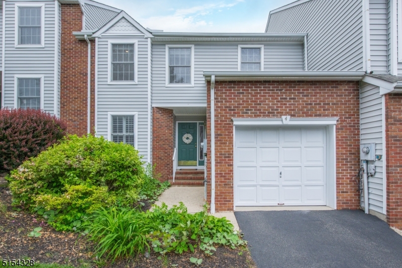 Bright & Cheerful Brae Loch Townhouse (Renovated 2014) with 3 BDRM, 2.5 Baths, a Highly Desirable Community! Features Hardwood Floors, Central Heating & Cooling, Sky lights & a gas Fireplace in LR. Ground level entry to all living spaces (LR, DR, Kitchen, bedroom, powder room, laundry and 1 car garage). Pella Slider Doors from kitchen offers access to a Small Patio & Grill area. 2nd floor features a Large Bedroom & a Primary Suite, two full baths with loft-featuring balcony overlooking first floor, great for home office or a game room. Unfinished basement has high ceilings and is perfect for a home gym. This townhouse also includes Central Vacuum, HUNTER DOUGLAS Custom Shutters, Security System & Skylights.Top-rated Mountain Lakes HS. Brae Loch offers a clubhouse, an outdoor pool and extra guest parking. Short drive to the TOURNE COUNTY PARK, which offers some of the best hiking, fishing, or just take a leisurely stroll. ONE YEAR AHS HOME WARRANTY INCLUDED. New Roof & New Skylights may be replaced in Aug 2022.