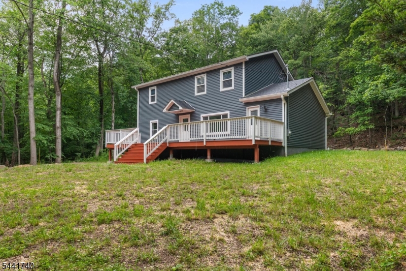 Are you looking for a freshly renovated home (in 2026) on over an acre, in a private setting, with a state park outside your door?  Come see 557 Burnt Meadow Road, within Norvin Green State Park, with miles of hiking trails in every direction!  This home features four bedrooms (new 4 BR septic system), 2 full baths, open floor plan, with 2 decks for outside enjoyment.  Laminate flooring throughout both levels, with tiled baths, & of course, everything is new!  The two bedrooms upstairs are very large, & LED high hat lighting are on both levels.  This home is ready for someone who loves the outdoors, surrounded by nature, & wants a bit of privacy. 2027 taxes are projected to be around $15K, according to the WM tax assessor.  An additional lot next door can be purchased for $25K, adding just over another acre, if desired.  Come see for yourself!