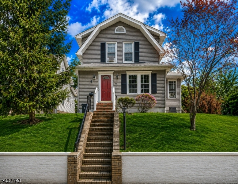 Welcome to 71 Spring St, a beautifully updated residence located in one of Nutley's most desirable neighborhoods, just minutes from NYC transportation, vibrant downtown dining, parks, and local shopping. This move-in ready home blends timeless character with modern updates, creating the perfect balance of comfort, style, and convenience for today's buyer.From the moment you arrive, you will feel a welcoming presence. Inside, you'll find bright, open living spaces filled with natural light, hardwood flooring, and an effortless flow designed for both everyday living and entertaining. The updated kitchen features modern finishes, quality cabinetry, and ample prep space, opening seamlessly into the main living areas.What truly sets 71 Spring St apart is its location. Nutley continues to attract buyers looking for more space, charm, and value while staying connected to Manhattan. Known for its strong sense of community, beautiful parks, walkable downtown, and quick access to major highways and transit, Nutley has quietly become one of Northern New Jersey's most sought-after destinations for NYC professionals and lifestyle-driven buyers. 71 Spring St offers the rare opportunity to enjoy suburban comfort with urban accessibility all within a home that feels both classic and current.