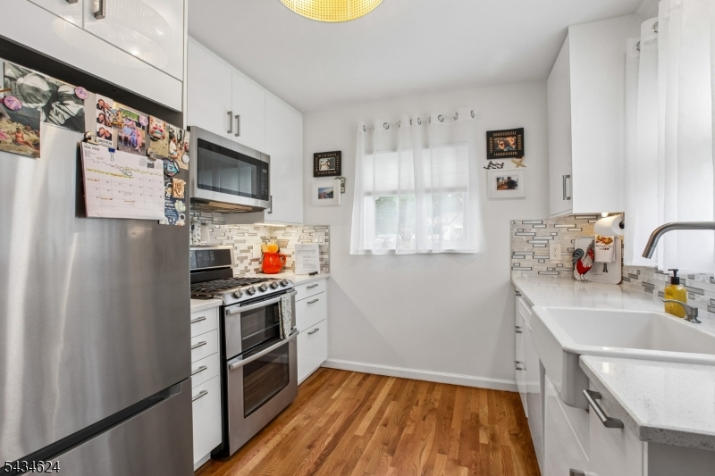 PRICE IMPROVEMENT- SELLERS ARE RELOCATING!!  Welcome to 1585 Barton Road in desirable Union, NJ   a meticulously maintained home that is truly move-in ready! This beautifully cared-for property features numerous upgrades, including a newer kitchen, newer roof, brand new furnace, brand new hot water heater, new appliances and hardwood floors throughout. Dishwasher in basement is included.  The remodeled second floor offers modern touches and added comfort, while the finished basement provides the perfect additional living space for entertaining, a home office, gym, or recreation area. Conveniently located near Kean University, Union Train Station, major highways, shopping, and dining, this home offers both comfort and commuter convenience. Pride of ownership shines throughout every inch of this property. Don't miss your opportunity to own this exceptional home, this one will not last!
