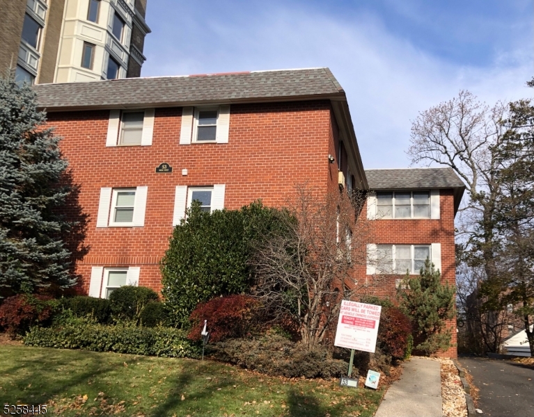 Sold with Concession.  Prime location on residential street.  ALL brick 3 story apartment building in the heart of beautiful and desirable Estate Section in Montclair.   SUNNY and SPACIOUS 7 Unit Apartment - (2) 2 Br Apts (One Renovated), (5) 1 Br Apts (Some renovated). Hardwood Floors in some units. 11 parking spaces, Indoor and outdoor parking. (4 Indoor garage- can be $350 per month and 6 Outdoor - can be $200 per month) Convenient to NYC trains and buses, shops, restaurants, parks, highways.  Coin Operated Washer and Dryer in Building on 1st Floor.  Rents are under market value.  Potential Gross Monthly Income: $16,600. Seller Financing NOT an OPTION. Cash preferred.