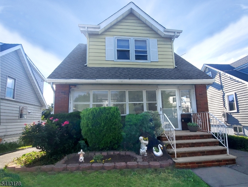 Beautifully maintained home located on a quiet, picturesque street in one of Belleville's most desirable neighborhoods. Upon entering, you're welcomed by an open-concept living and dining area with hardwood floors beneath the carpet, along with 3 bedrooms and a full bath on the second floor. The finished basement offers a full bathroom, kitchenette, and versatile space ideal for a recreation room, home office, or additional living area. Enjoy the fenced backyard, perfect for pets and outdoor entertaining. A detached garage and driveway parking for four additional vehicles provide exceptional convenience. Ideally located near Belleville Park, Hendricks Field Golf Course, NYC bus transportation, shopping, schools, and just minutes from the Garden State Parkway. A commuter-friendly home offering space, flexibility, and pride of ownership throughout.