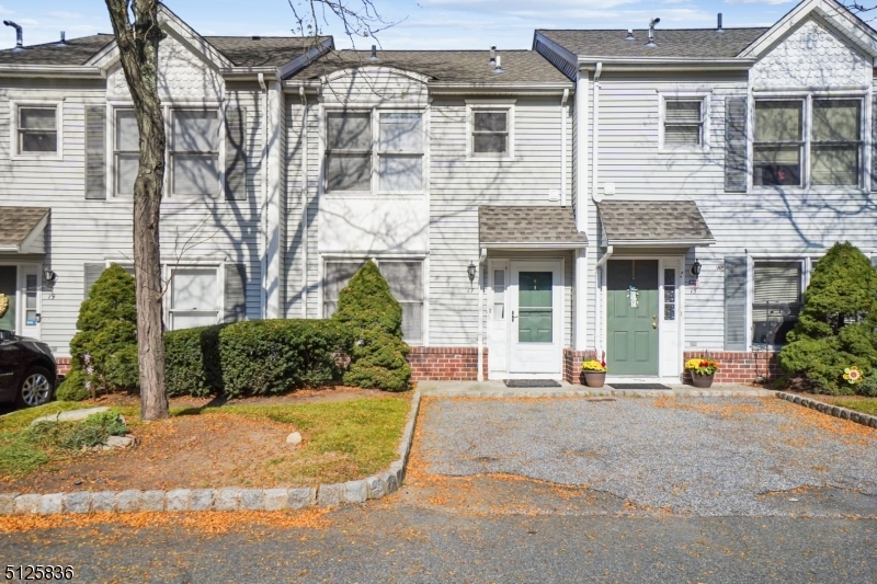 Back on Market - Freshly painted with new carpeting, this model unit is the perfect alternative to renting. The main level has a living room, kitchen, powder room and separate dining area.  Balcony off dining room lets in plenty of afternoon sun and views. Upstairs, 2 bedrooms and a full bath are just down the hall from laundry.  A converted garage on the lower level is a great space for a home office, playroom or extra storage. Great commuter options with NJ Transit Denville station, quick access to Routes 80, 46, and 10 - all minutes away! Newer microwave & refrigerator replaced 2 years ago, washer & dryer, 4-year-old AC unit, and water heater. Two dedicated parking spots and open parking lot for guests.  This is a great alternative to renting.