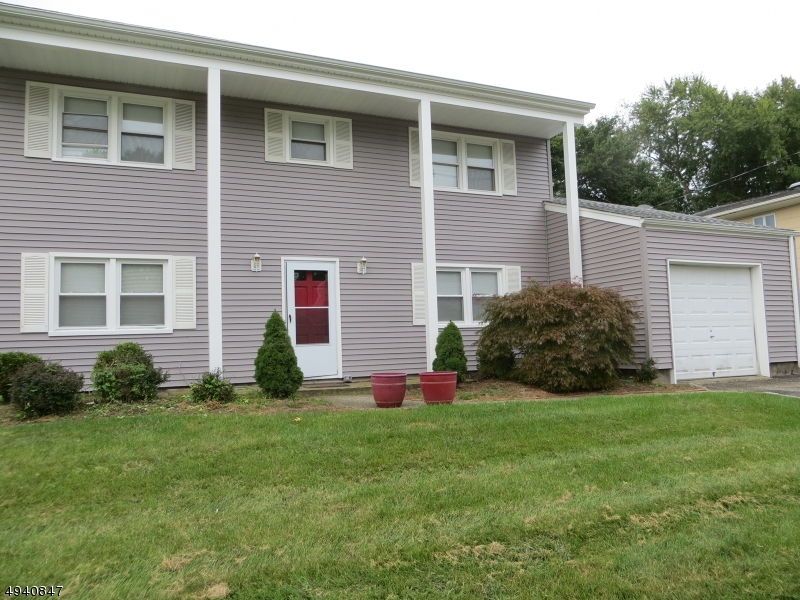 THIS GREAT 4-BEDROOM HOME FEATURES: HARDWOOD FLOORS ON THE SECOND  LEVEL, AND NEW FLOORING ON THE LIVING ROOM AND FAMILY ROOM.  WHITE KITCHEN WITH TILE FLOORING.  NEUTRAL DECOR, LARGE FEMCED-IN  BACKYARD WITH PATIO.  CONVENIENTLY SITUATED TO HIGHWAYS AND SHOPPING. DON'T MISS OUT OF THIS FANTASTIC OPPORTUNITY TO RENT THIS HOME.