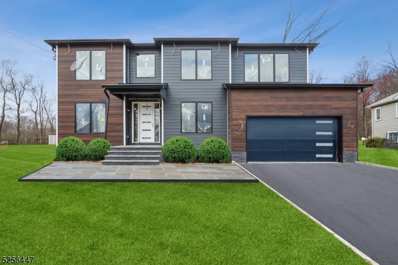 Nestled on this expansive wooded flat lot, this breathtaking new construction offers unparalleled luxurious living.Step inside to discover an interior designer's dream, an open floor concept highlighted by stunning white oak engineered floors that flow seamlessly throughout. A grand entrance w/floating staircase soaring 9-foot ceilings, decorative molding& inviting atmosphere that permeates every corner of this 4690-sq ft.home. Expansive windows flood the home with natural light.The gourmet kitchen features off-white cabinets, a striking black island w/quartz waterfall countertop & top-of-the-line Thermador appliances and paneled wooded ceiling area, stunning. Inviting family room, complete with a gas linear fireplace and floating shelves. The first floor offers a guest suite with a full bathroom and powder room, while the second floor boasts spacious bedrooms, including one with an ensuite with custom closets. The second floor also features the main spa-like bathroom.A large second-floor laundry room adds to the home's practicality.The luxurious primary bedroom featuring a tray ceiling, walk-in closet w/California-style built-ins & spa-like ensuite bath complete with a soaking tub,large shower, toilet, bidet,&custom vanities w/ Kohler plumbing fixtures.Finished basement, includes a media room with built-ins, wet bar, guest bedroom with full bath, gym, and den.Backyard oasis w/paver patio.Ample space for pool & sport court.Near houses of worship,school, shopping,pool,rt280.