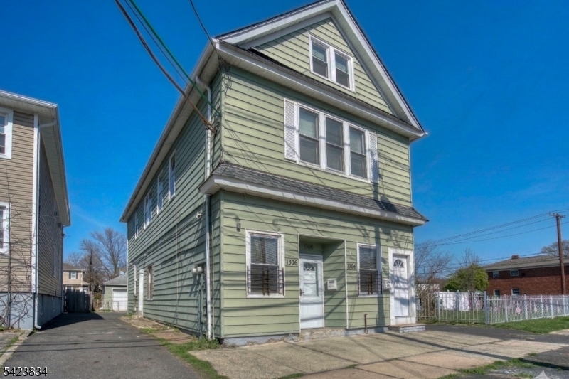 Back on the market. Great opportunity to own a multi-family in the heart of Linden. Perfect for investors or owner occupants to generate rental income. This property features two updated kitchens with a living room and a full bath in each floor. A bonus attic apartment with a full bath a kitchen. An unfinished basement with walkout exit for the new owner to customize and add value. Parking space for up to six cars. The property is in a good condition and is being sold AS-IS.  The property will be delivered vacant at closing. Conveniently located near shopping, dining and schools. Just minutes away from the Linden Train Station for an easy commute to NYC.Whether you are looking to expand your investment portfolio or live in one unit while renting the other, this property offers exceptional value and tremendous potential.