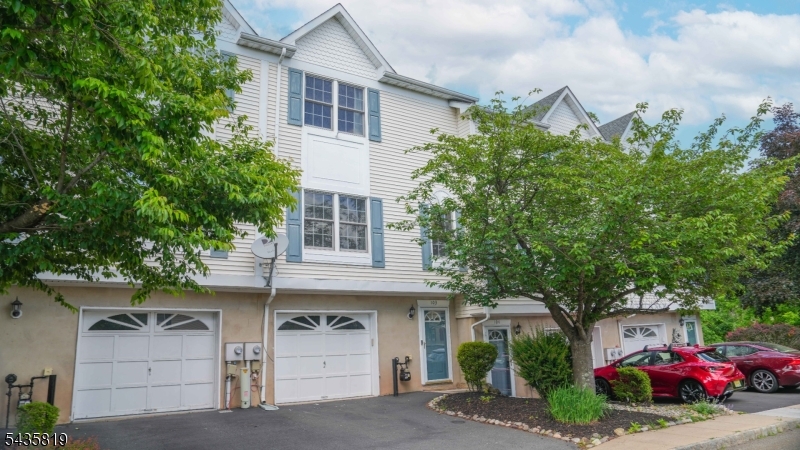 Welcome to this beautifully maintained 2-bedroom, 1.5 bath townhome ideally situated in the heart of Flemington Borough's exciting downtown redevelopment district. Offering a perfect blend of comfort, style, & convenience, this move-in-ready home features gleaming hardwood floors throughout, abundant natural light, and an open, inviting floor plan. The spacious living room flows seamlessly into the well-appointed kitchen, complete with granite countertops, 42-inch maple cabinetry, and direct access to a large private deck perfect for outdoor dining, entertaining, or simply relaxing. Upstairs, the impressive primary bedroom boasts vaulted ceilings, generous closet space, and a luxurious soaking tub, creating a peaceful retreat at the end of the day. The ground level offers convenient access to the attached garage, an additional bedroom or flexible living space, & direct access to the rear of the home. Pride of ownership is evident throughout, making this property truly turnkey. Enjoy all that Flemington has to offer, with shopping, dining, entertainment, and major highways just minutes away. Don't miss this opportunity to own a beautiful home in one of Hunterdon County's most sought-after and rapidly growing communities.