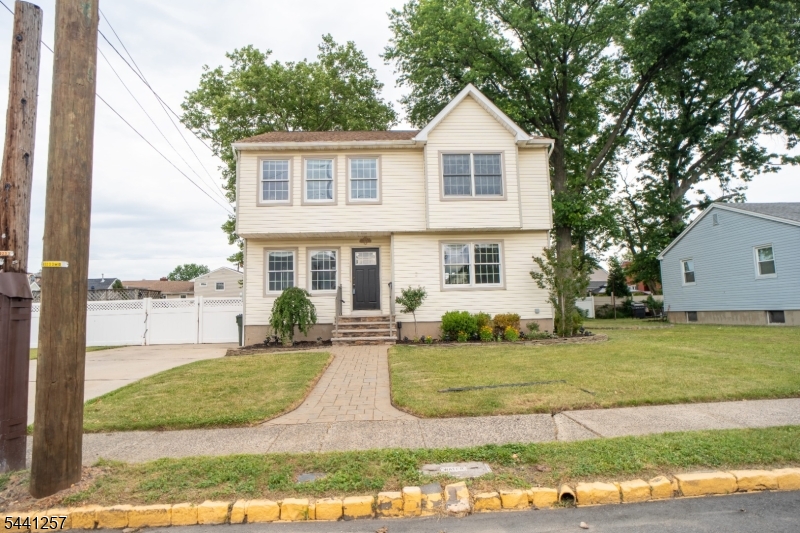 Welcome to 130 Loretta Street in the desirable Hopelawn section of Woodbridge Township. This beautifully maintained Colonial offers 3 bedrooms, 2.5 bathrooms, and over 1,800 square feet of living space on a rare oversized double lot.    The main level features hardwood floors, recessed lighting, and a bright, open layout ideal for everyday living and entertaining. The updated kitchen is equipped with granite countertops, custom cabinetry, modern appliances, and ample storage.    Upstairs, the spacious primary suite includes a private bathroom and generous closet space. Two additional bedrooms provide flexibility for guests, a home office, or other needs. A partially finished basement adds valuable living space, while the attic offers additional storage and future possibilities.    Outside, enjoy the benefits of an oversized double lot with plenty of room for outdoor entertaining, gardening, recreation, or future expansion. A large driveway provides ample off-street parking. Conveniently located near major highways, shopping, dining, parks, and public transportation, this move-in-ready home offers the perfect combination of space, comfort, and convenience.