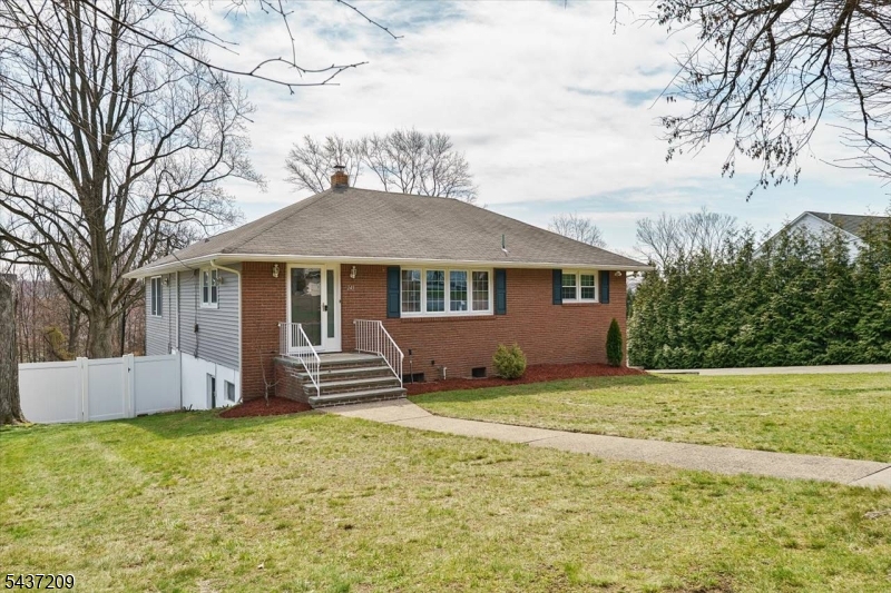 A rare find in Totowa! This custom brick front ranch with in-law suite potential is nestled on a quiet street that backs up to the PAL. Situated on a .67 acre lot,  the main level offers 3 Bedrooms, full bath, updated eat-in kitchen with granite counters, vinyl floors and tile back splash, Dining Room, LR , Walk-up attic for storage, Family room addition with gas fireplace and separate heat w/entry to deck. The lower level with a separate ground floor entrance which walks out to the patio features a summer kitchen, dining room, 4th bedroom with huge walk in closet, full bath, living room/family room and a possible 5th BR. Hardwood floors, recessed lighting, central air, replacement windows, A mechanic's dream w/ a 2 Car heated garage & loft storage, huge driveway with parking for up to 20 cars! Oversized lot with vinyl privacy fence, underground sprinkler system, newer water heater (2022). All appliances included. Located on a very quiet street in town that backs up to the Totowa PAL.  This is the one you have been waiting for!  Home to be Sold in "As Is" Condition. Inspections limited to major structural, environmental and wood boring insects.