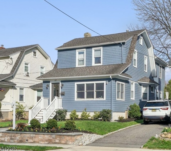 Welcome to this pristine 4-bedroom, 2.1-bath Colonial located in one of Verona's most desirable neighborhoods! From the moment you arrive, you'll appreciate the meticulous curb appeal and beautifully landscaped grounds. Step inside to a welcoming vestibule perfect for starting and ending your day. The inviting living room flows seamlessly into a fabulous home office, featuring a custom glass sliding door, charming built-in shelving, and remote-controlled blinds. The updated, spacious kitchen opens to a large dining room and flows effortlessly into the sunlit family room, creating the perfect layout for everyday living and entertaining. From here, step outside to an expansive deck and patio overlooking an entertainer's dream backyard. Upstairs, you'll find four generously sized bedrooms and a beautifully renovated full bath. The primary suite offers vaulted ceilings, a large walk-in closet, and a stunning en-suite bath. The finished basement provides excellent additional living space, complete with a recreation area, custom storage shelving, laundry room, and a half bath. A detached garage offers incredible flexibility ideal for storage, hobbies, or even a potential home gym. Conveniently located near top-rated schools, parks, and Verona's vibrant downtown, this home truly offers the best of community living.