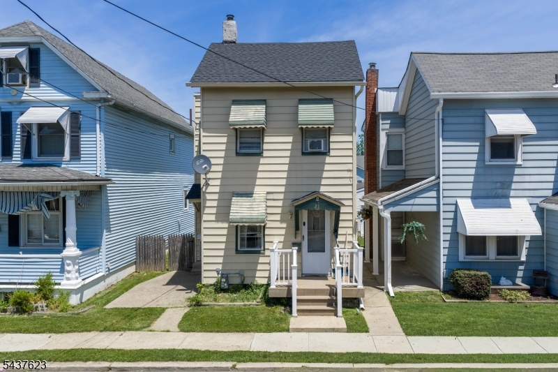 Welcome to 21 Henderson Street, Phillipsburg, NJ. This charming detached Colonial offers an excellent opportunity for first-time homebuyers, investors, or anyone looking for an affordable single-family home with private outdoor space and a detached garage.Situated on a quiet residential street, this 2-bedroom, 1-bath home offers approximately 960 square feet of living space with a functional layout designed for everyday comfort. The main level features a spacious living room filled with natural light, a large eat-in kitchen with ample cabinetry and dining space, convenient main-floor laundry, and a full bathroom. Upstairs, you'll find two generously sized bedrooms with plenty of natural light and closet space.Step outside and enjoy your fully fenced backyard, complete with a patio area, year old roof, storage shed, and room for gardening, pets, entertaining, or relaxing. The detached one-car garage provides valuable parking, storage, or workshop potential, while rear alley access adds convenience.Located close to schools, parks, shopping, dining, major commuter routes, and downtown Phillipsburg amenities, this home offers the perfect combination of affordability, convenience, and outdoor living. Nearby schools include Phillipsburg Primary School, Phillipsburg Middle School, and Phillipsburg High School. Residents enjoy convenient access to local parks, recreation areas, shopping, restaurants, and the Delaware River corridor.